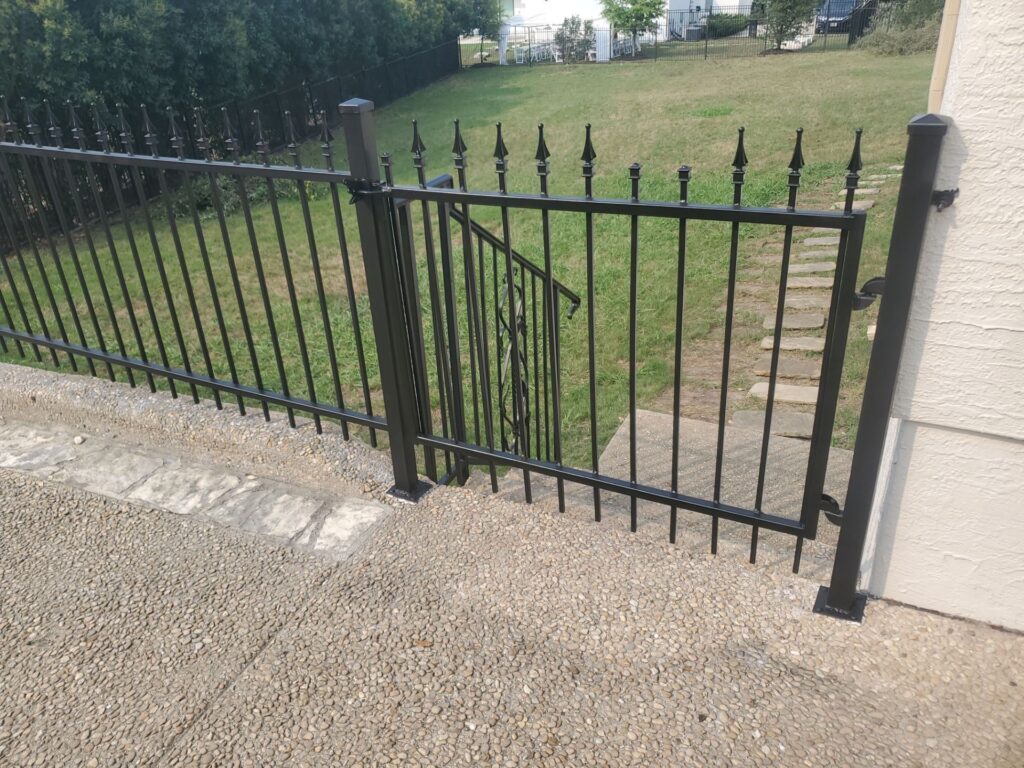 rusty wrought iron fence